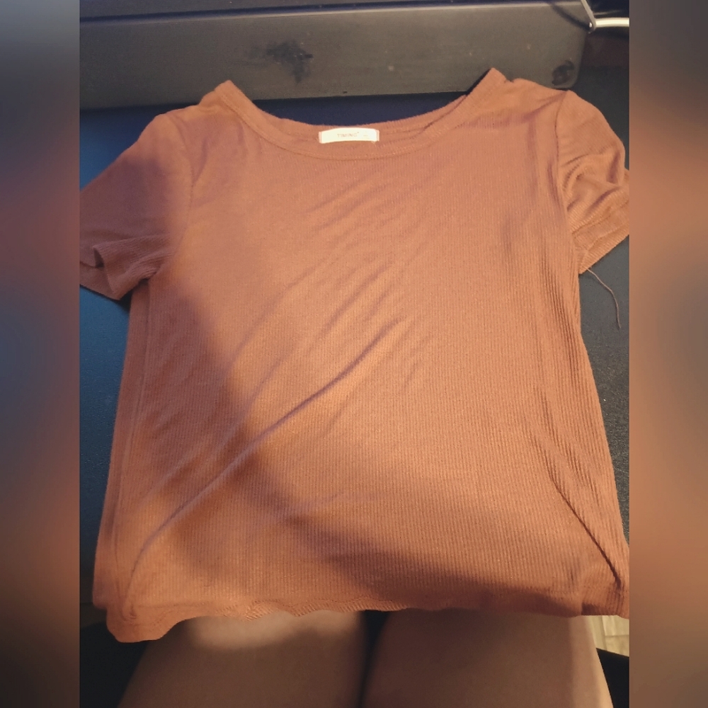 Burnt orange tight shirt